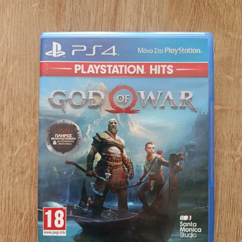 God of War PlayStation 4 game like new with booklets