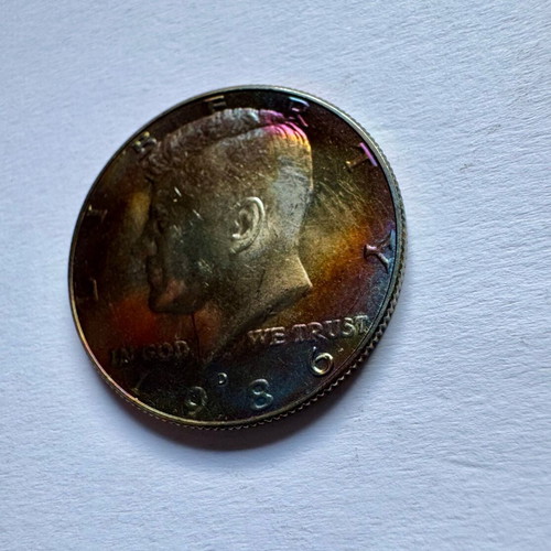 Kennedy Half Dollars 1986 D in excellent condition with rainbow patina