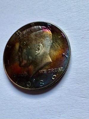 Kennedy Half Dollars 1986 D in excellent condition with rainbow patina