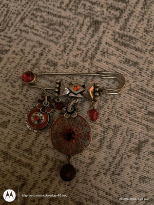 Decorative safety pin brooch like new with hanging charms
