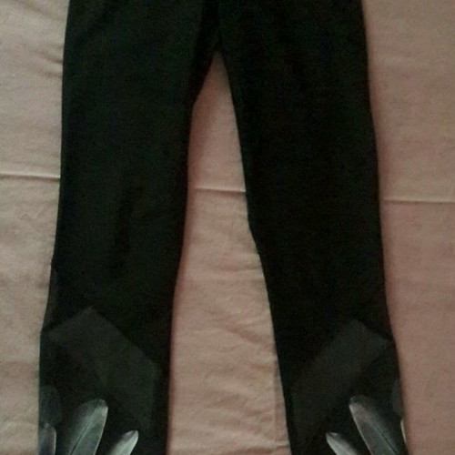 Black women's leggings new with beautiful detail at bottom, X small