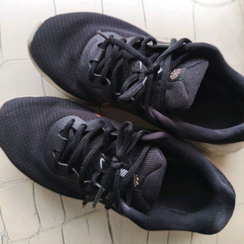 Nike shoes size 38.5 used, black with gold logo, athletic