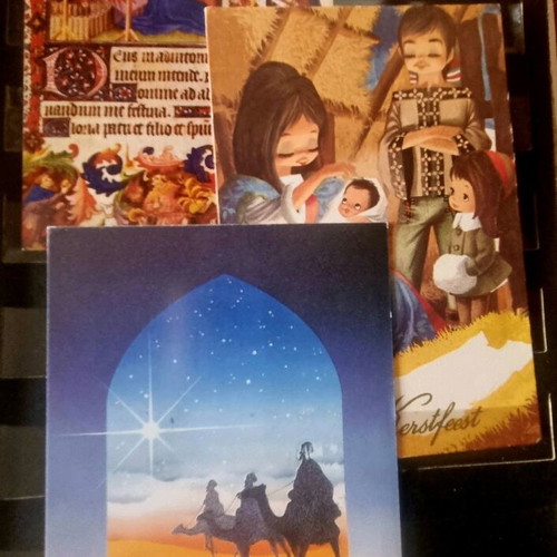Vintage festive album with 80 cards like new