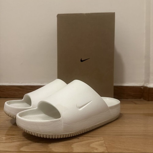 Nike men's white Calm slides size 42.5, used with signs of wear