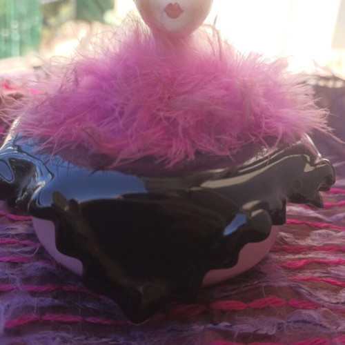 Clay jewelry box used with pink base and black top with Charleston doll feather