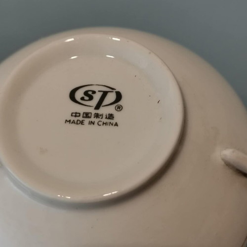 Set of two used Chinese tea cups with blue design and silver trim