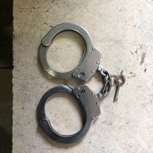 Old gendarmerie handcuffs used with original key