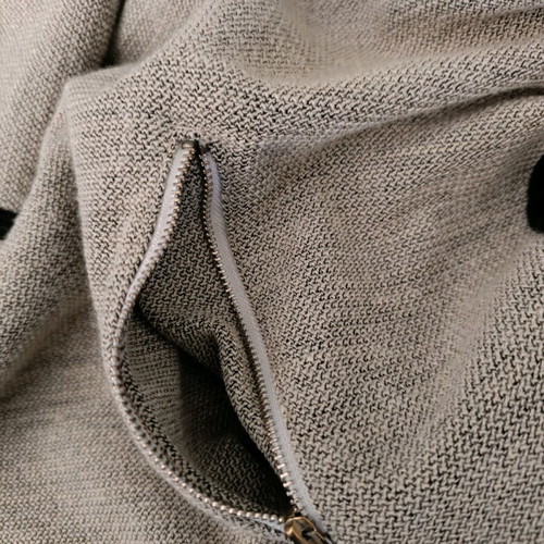 Short women's coat with a waterfall collar
