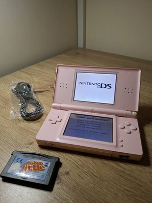 Nintendo DS Lite Coral Pink like new with charger and GBA game