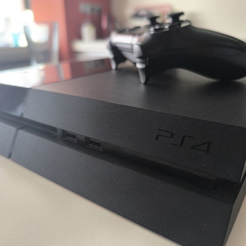 PlayStation 4 500GB console used with DualShock 4 controller