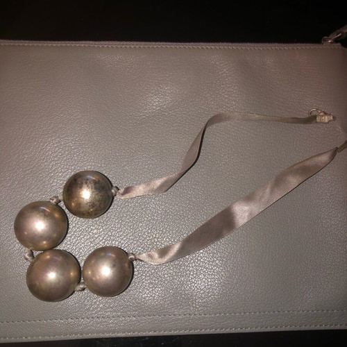 Necklace with silver beads on gray satin ribbon used
