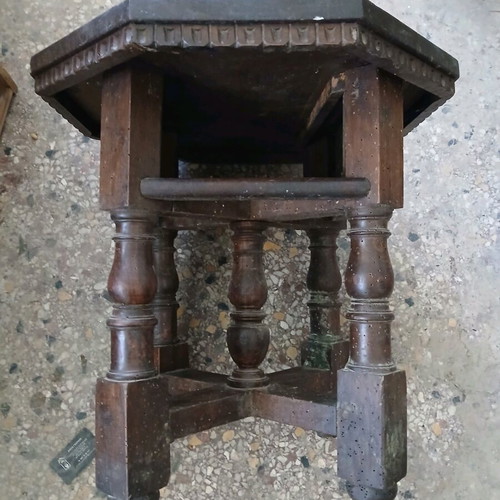 Vintage wooden table used, Victorian era with octagonal surface