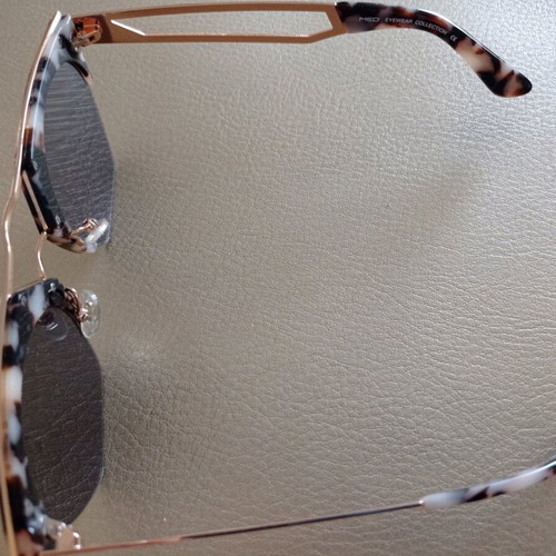 Med sunglasses used with metal and acetate frame, pink gold lenses