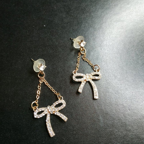 Bow earrings dangling new