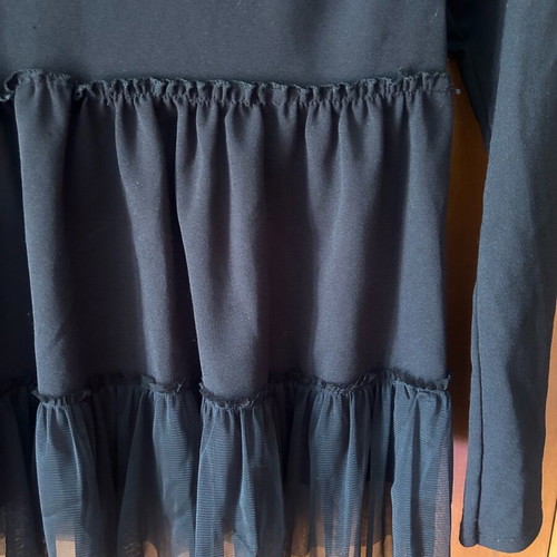 Women's blouse like new, black with tulle ruffles