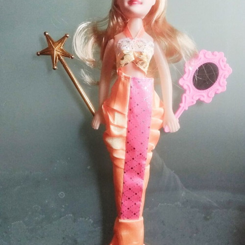 Mermaid doll unused with mirror and magic wand