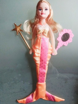 Mermaid doll unused with mirror and magic wand