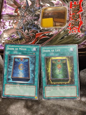 Book of Moon and Book of Life used Yu-Gi-Oh! cards