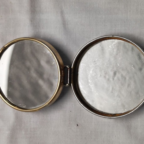 Vintage small portable mirror used with floral design