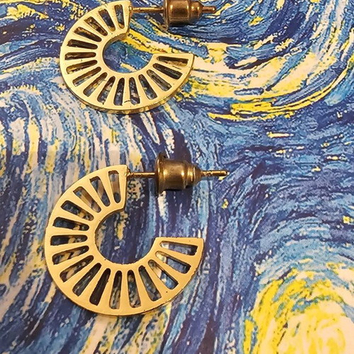 Modern earrings like new