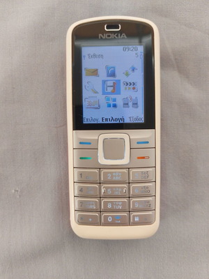 Nokia 5070 mobile phone used, white, with battery