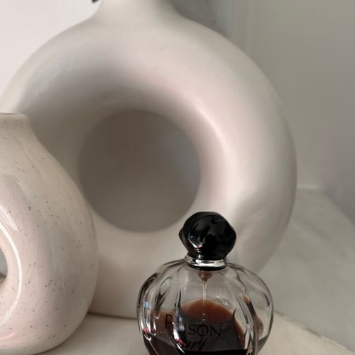 Dior Poison Girl eau de parfum used, contains half of original quantity
