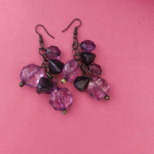 Earrings used, purple and green available