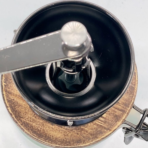 Hario manual coffee grinder like new with storage container