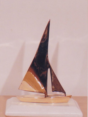 Handmade sailboat sculpture in bronze on marble base like new