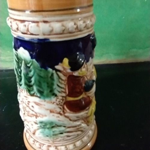 Decorative ceramic beer mug like new with embossed designs