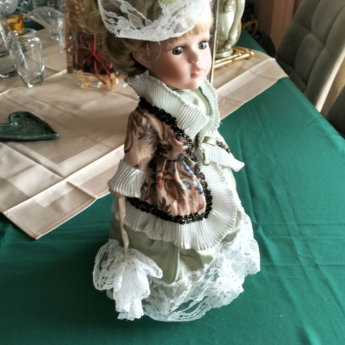 Vintage porcelain doll new in packaging