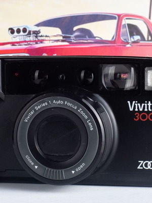 Vivitar 300Z 35mm film camera used, no flash