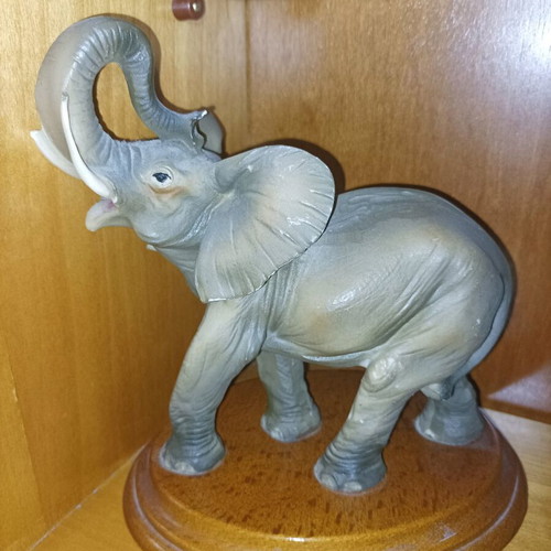 Decorative elephant statue used with wooden base vintage