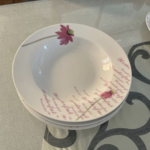 Dinnerware set like new, 6 large, 5 deep, 6 small plates and a platter