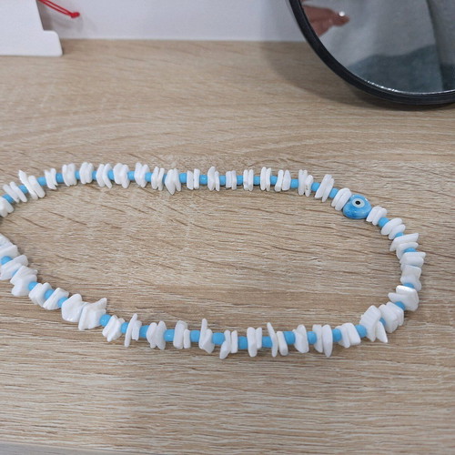 Handmade necklace with coral, glass beads and ceramic heart eye