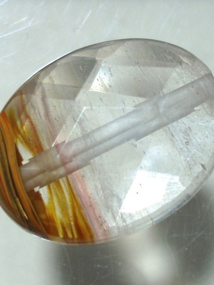 Quartz mineral with oxide inclusions like new, 14.70ct, with hole