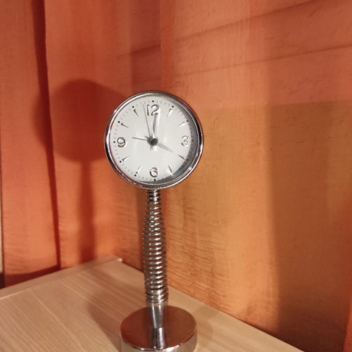 Spring tabletop clock used, analog