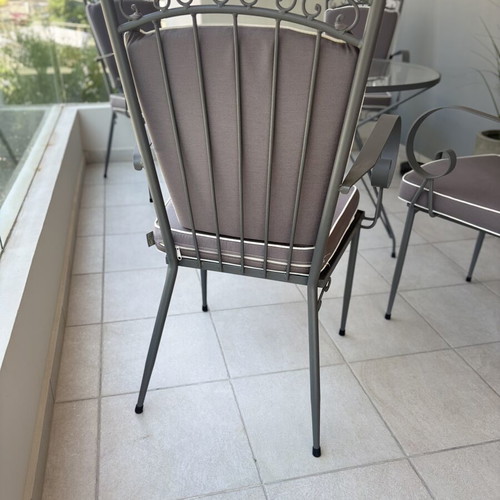 Outdoor dining set used, iron with cushions