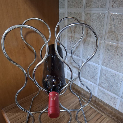 Metal Wine Rack like new, wave design, holds 6 bottles
