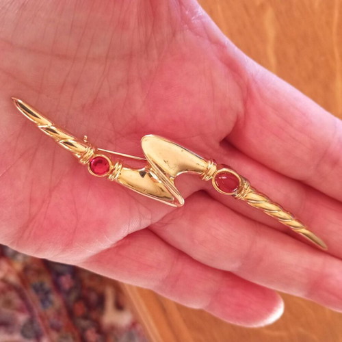 Vintage lightning bolt brooch with red stones, like new