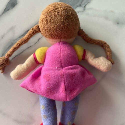Small cloth doll used with braids