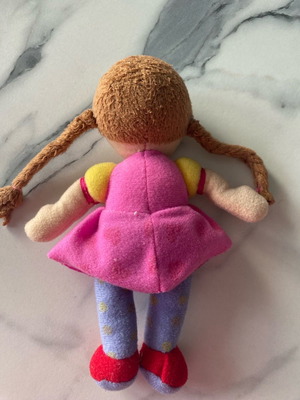 Small cloth doll used with braids