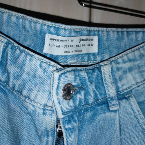 High-waisted shorts used, size 40