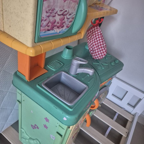Fisher Price children's play kitchen with microwave and washing machine