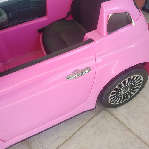Children's Car Pink electric car with battery and charger. FIAT 500
