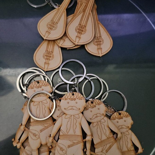 Cretan handmade wooden keychains new, all together