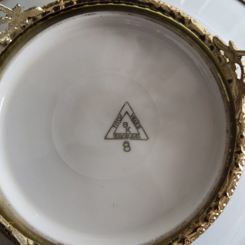 Vintage porcelain decorative plate with gilded details