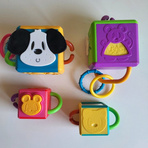 4 Hasbro Chain Cubes used, educational toy