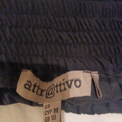 Attrattivo mini skirt like new, size Small, black with lace trim