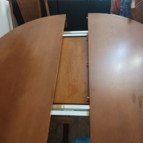Walnut dining table with chairs used, round extendable, classic design
